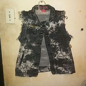 Black white and grey sleeveless jacket